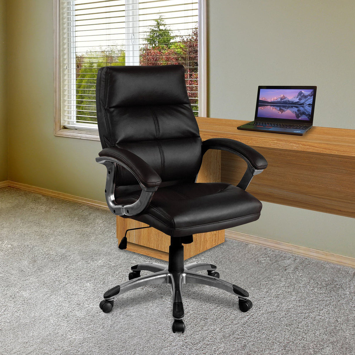 Nautilus Designs Greenwich High Back Leather Effect Executive Armchair with Silver Detailed Black Nylon Base - Black