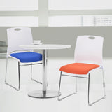 Nautilus Designs Kore Stylish Stackable Chrome Frame Chair with Padded Upholstered Seat, White Shell and Hand Hole in Backrest - 2 per Box -Orange