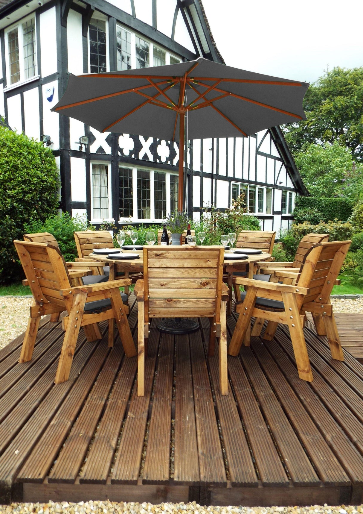 Charles Taylor Eight Seater Circular Table Set with Cushions and Parasol